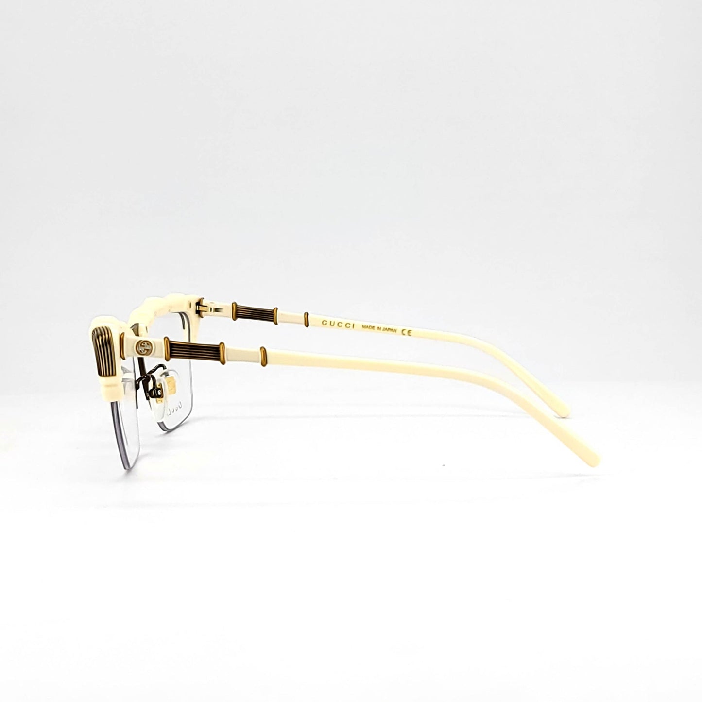 Gucci GG0660O-002-58 eyeglasses in gold frame with clear lenses