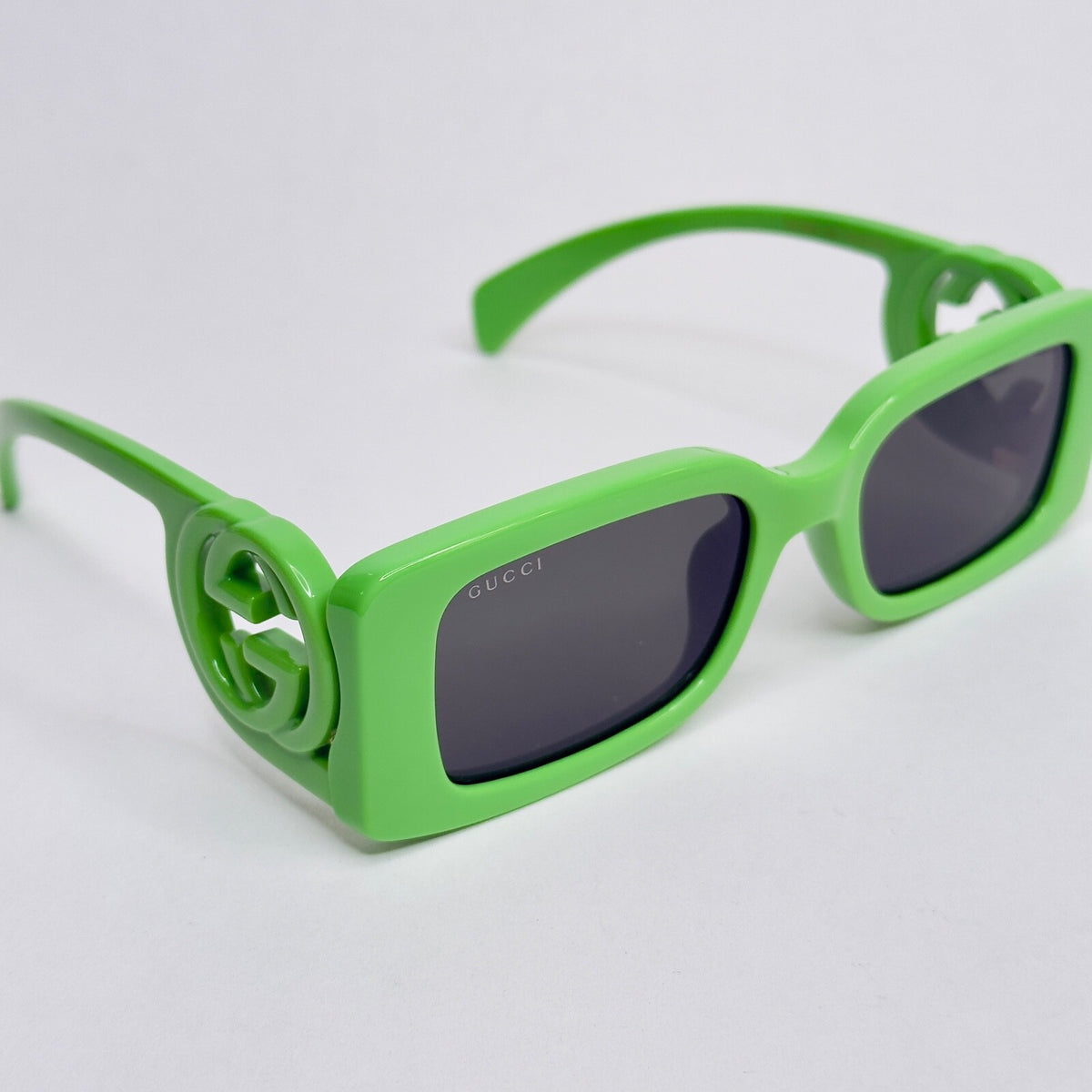 Gucci GG1325S-009-54 sunglasses in green frame with grey lenses