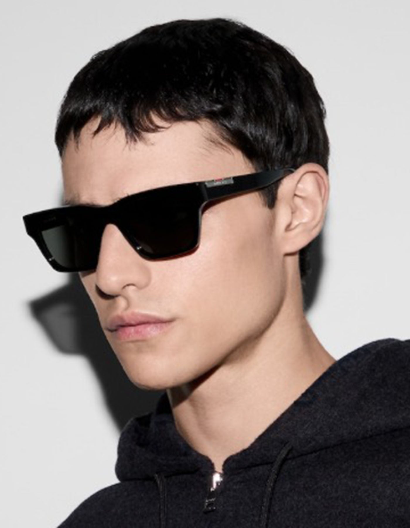 Gucci GG1889S-001 sunglasses in black frame with gray lenses
