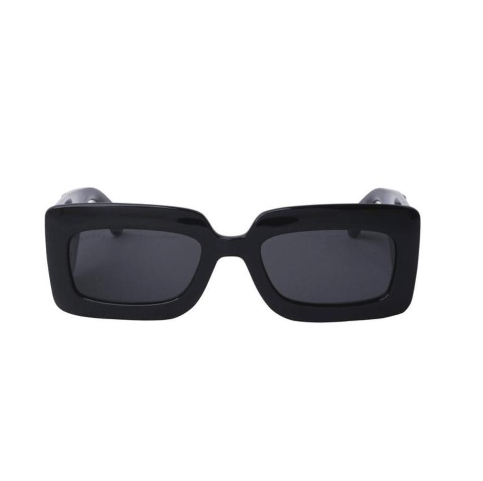 Gucci GG0811S-001 sunglasses in black frame with grey lenses