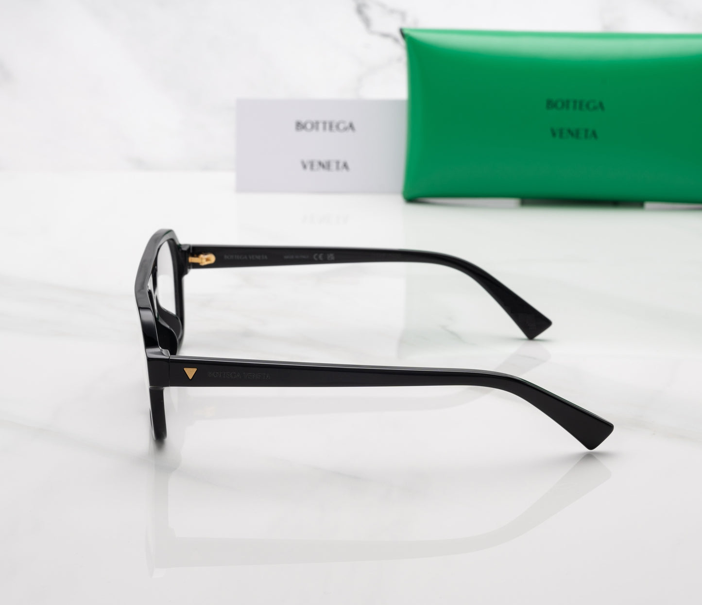 Bottega Veneta BV1336oA-001 eyeglasses in black advertising frame with clear lenses