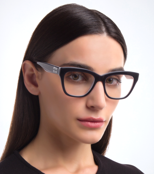 Miu Miu MU03UV-ACO1O1-52 eyeglasses in black frame with clear lenses