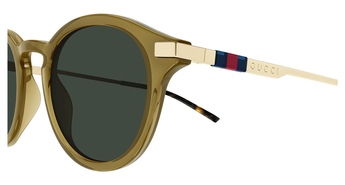 Gucci GG1890S-003 sunglasses in gold frame with green lenses