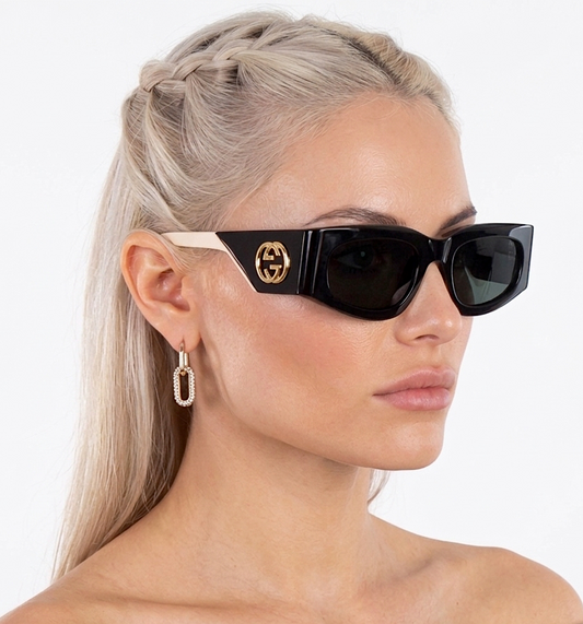 Gucci GG1664S-001-51 sunglasses in black frame with grey lenses