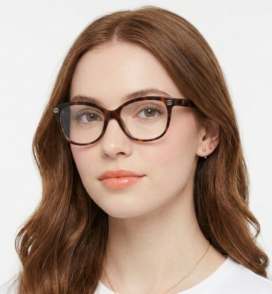 Gucci GG1816o-002 eyeglasses in havana frame with clear lenses