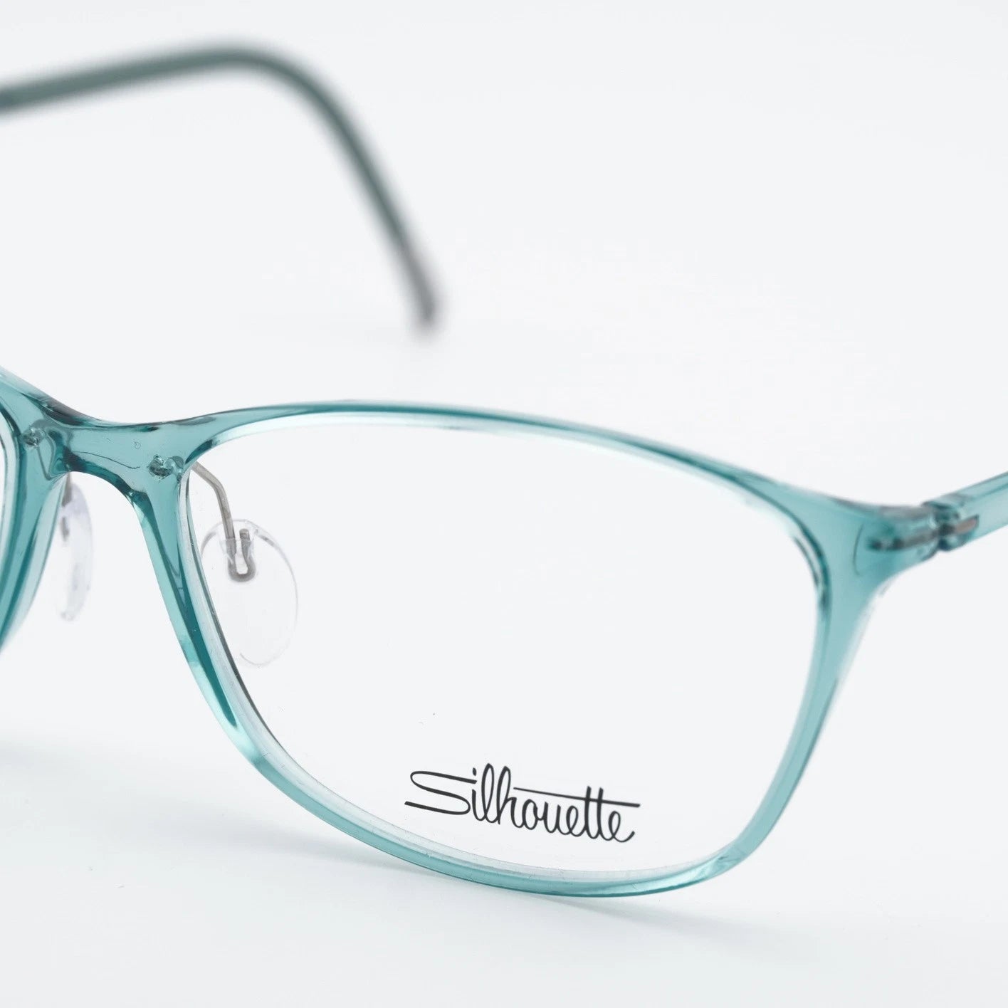 Silhouette SPX Illusion Fullrim 1603/75-5111 eyeglasses in carribbean blue shiny frame with clear lenses